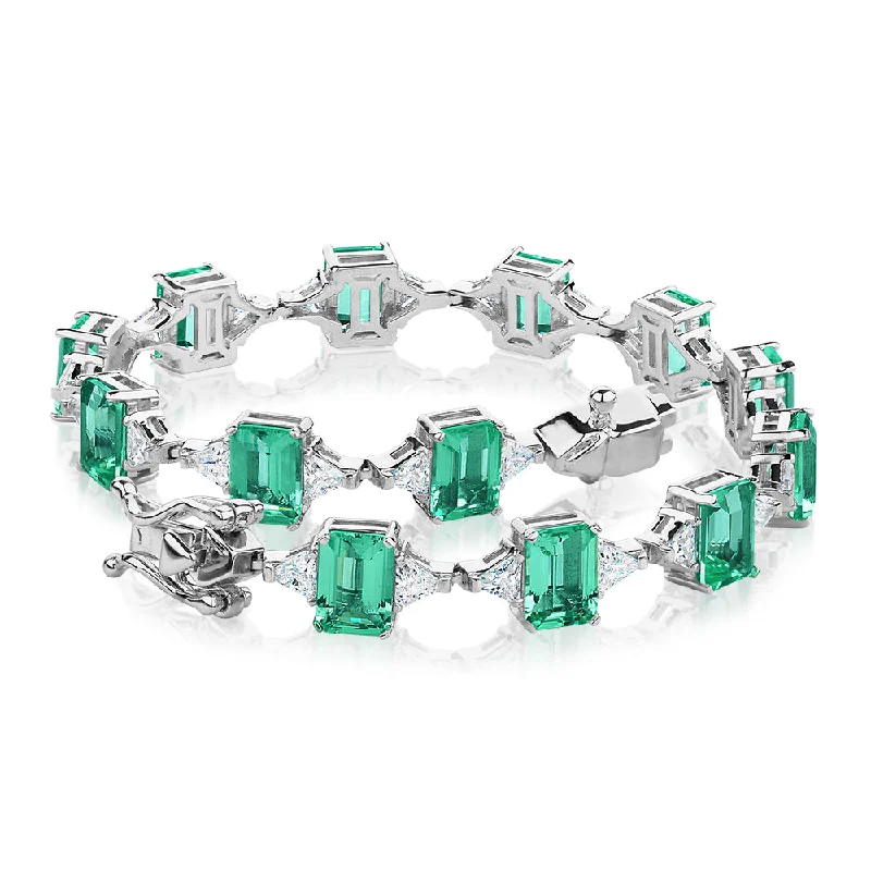 Custom Gold Bracelet for Men-Emerald Cut and Trilliant tennis bracelet with ocean green simulants and 3.12 carats* of diamond simulants in sterling silver