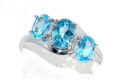 Modern Sapphire Engagement Ring-2 Ct Blue Topaz Oval Ring .925 Sterling Silver Rhodium Finish