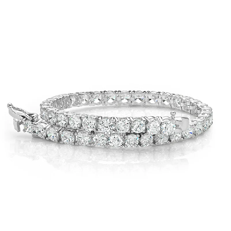 Handmade Gold Bangle Bracelet-Round Brilliant tennis bracelet with 11 carats* of diamond simulants in 10 carat white gold