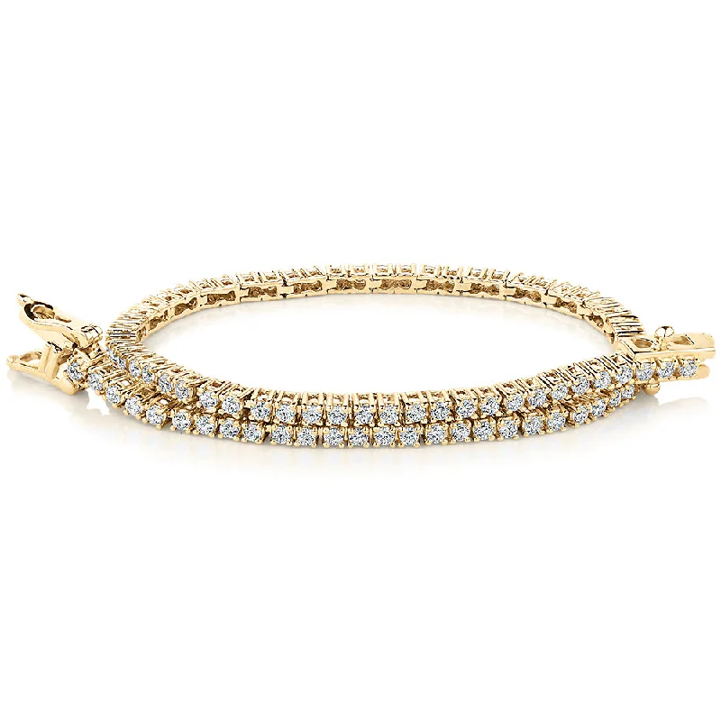 Elegant Gemstone Wedding Bracelet-Round Brilliant tennis bracelet with 1.29 carats* of diamond simulants in 10 carat yellow gold