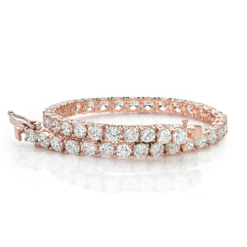 Elegant Gold Cuff Bracelet-Round Brilliant tennis bracelet with 11 carats* of diamond simulants in 10 carat rose gold